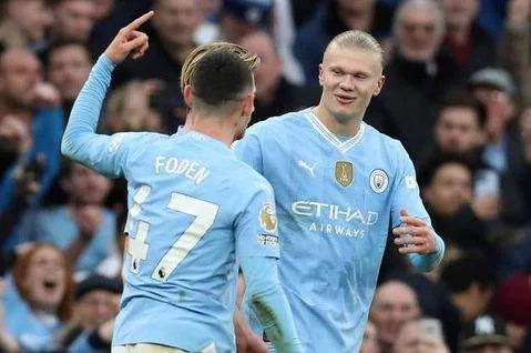 Phil Foden and Erling Haaland against Manchester United - Imago